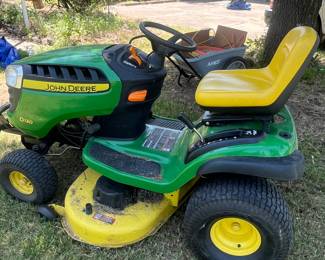 This John Deere just kicks butt. I have mowed this property with this little guy. It just tears it All Down.!! All the accessories, attachments are with it.