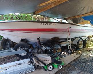 Hydrasport 24' fiberglass boat 1979 with trailer and two Evinrude 140hp outboard motors.