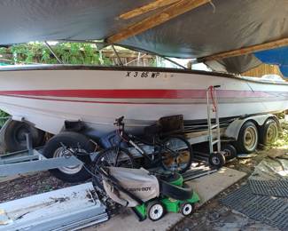 Hydrasport 24' fiberglass boat 1979 with trailer and two Evinrude 140hp outboard motors.