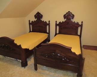 Beautiful antique twin beds. You don't find them like this everyday!