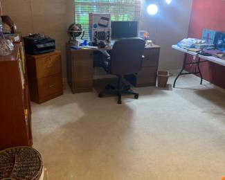Desk, desk chair, filing cabinet, shelves