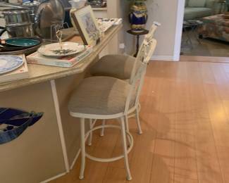 Pair of swiveling barstools