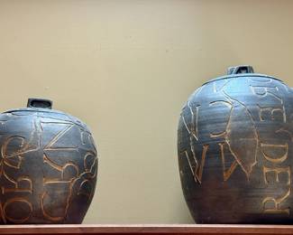 Two Ceramic Jugs with Lids