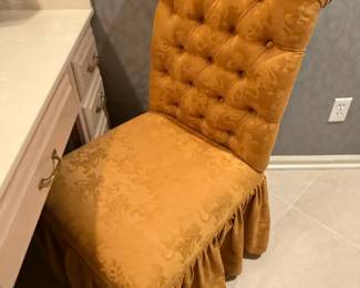 Tufted Upholstered Gold High Back Chair with a Skirted Base