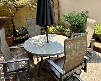 Round Outdoor Table with Umbrella and 4 Swivel Rockers