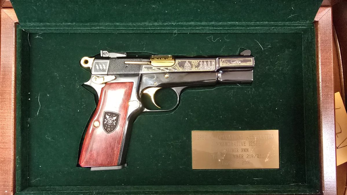 Browning Hi Power 9mm, Special Operations Association special issue 219 of 250! Bad to the bone much nicer in person comes with display case, white gloves, paperwork, and original Browning case.