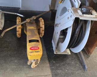 hose reel and vintage tractor sprinkler