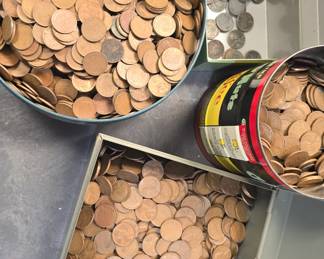 Massive piles of unsearched wheat pennies , and some steel pennies. there are early years in here