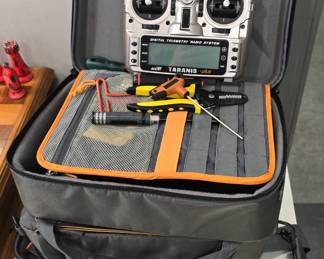 Drone controller with tools and carrying case