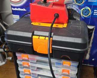 soldering iron and kit for working on drones full of little motors and more