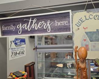 family gathers here sign