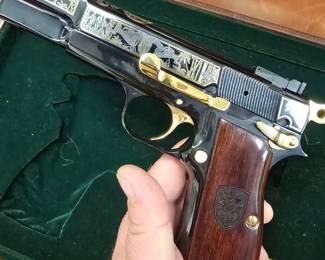 Browning Hi Power 9mm, Special Operations Association special issue 219 of 250! Bad to the bone much nicer in person comes with display case, white gloves, paperwork, and original Browning case.