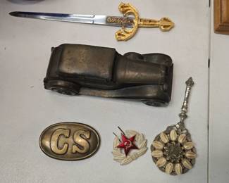 vintage goodies, belt buckle knife mirror and car bank