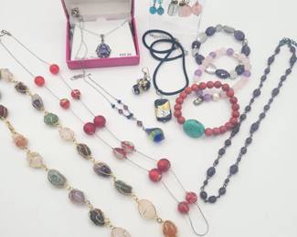 160 ACollectionofArtisanCraftedGemsPolishedJewelry