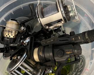 lots of fishing reels...