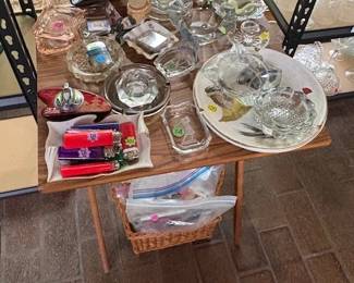 Vintage ashtrays, lighters and matches.