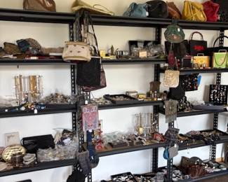 Tons of beaded bags, leather purses, costume jewelry, clocks, compacts, etc.