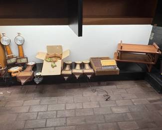 Banjo clocks, cuckoo clock and Marxophone.