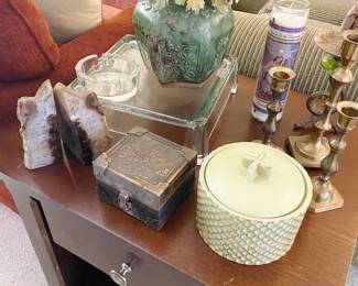 End Table filled with decoratives including polished agate quartz bookends
