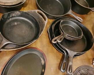 Large selection of cast iron skillets and dutch oven