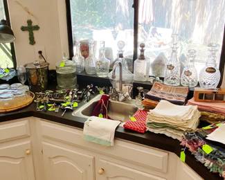 Bar Area filled with crystal decanters, accessories, placemats and napkins