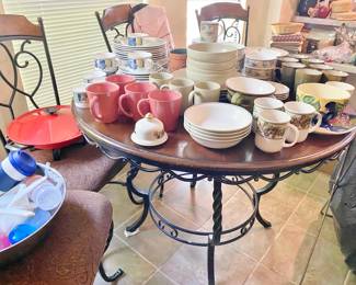 Kitchen Table, round with iron base and trim, 4 chairs, packed with china