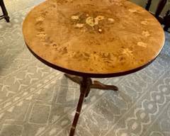 Mid century round Italian side table featuring marquetry style hand inlaid floral design Dimensions: 17.5" diameter x 20.5" tall' $275.00