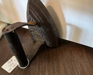 Vintage Cast iron hand iron/great door stopper! $40