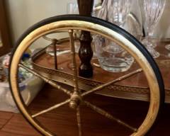 2 large brass spoke wheels