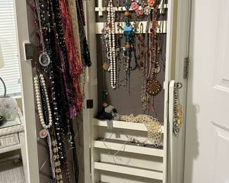 TONS of costume jewelry- necklaces and bracelets and earrings