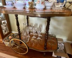 Beautiful brass lip, 3 bottle holders and 2 large spoke wheels on this vintage Italian bar cart