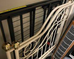 Ivory metal twin daybed with brass knobs $175
