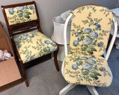 Vintage wooden side chair and white desk chair on casters covered in yellow/blue fabric $30 each