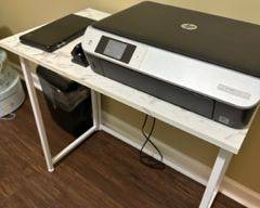 HP Envy 5530 Print/Scan/Copy/Photo/Web ($30) and small white metal desk ($20). On ground is Aurora WM675XB paper shredder ($15)