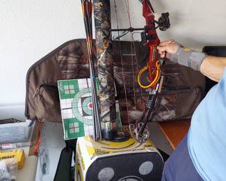 Compound bow, case, target cube, paper targets, arrows and arrows cylinder.   Sold as a complete set.