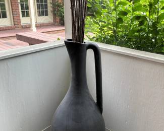 Very tall lovely terra cotta vase...use in home or on screen porch...stunning!