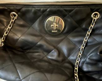 DKNY Gorgeous leather bag with goldtone trim...this is a beautiful bag in incredible condition!