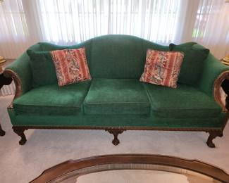 Vintage camelback sofa