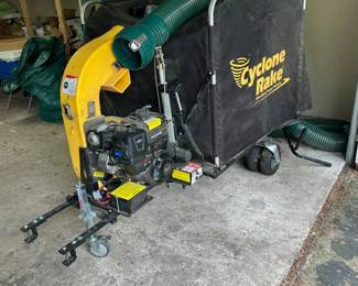 Cyclone Rake XL all set up on the trailer and ready to go! Pull behind the John Deere riding mower