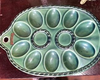 The debate is on...Is it a pipe stand or and Egg Dish??