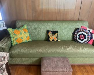 MCM sofa folds out to make a trundle style sleeper