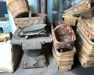 old REX stove and fruit baskets as well as vintage labeled cans