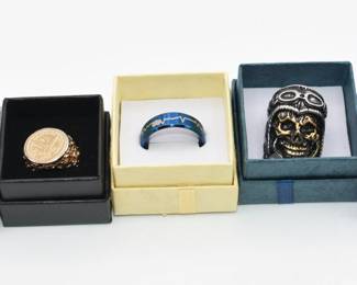 lot of 4 silvertone and 1 goldtone rings