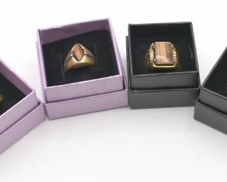 lot of 4 Tiger Eye rings
