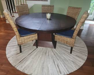 Dining table and 6 wicker chairs