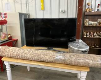 Flat Screen TV - Floor Rug - Pressure Cooker