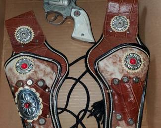 Vintage cap guns with holster.