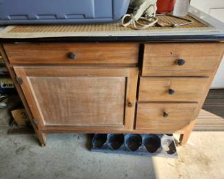 Vintage cabinet with black porcelain top