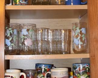 Contents Of Cabinets: 10 Ikea Glasses 5 Hand Painted Glasses And Mugs.