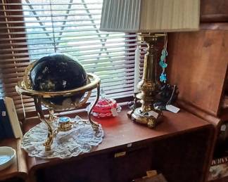A few books, the globe and lamp